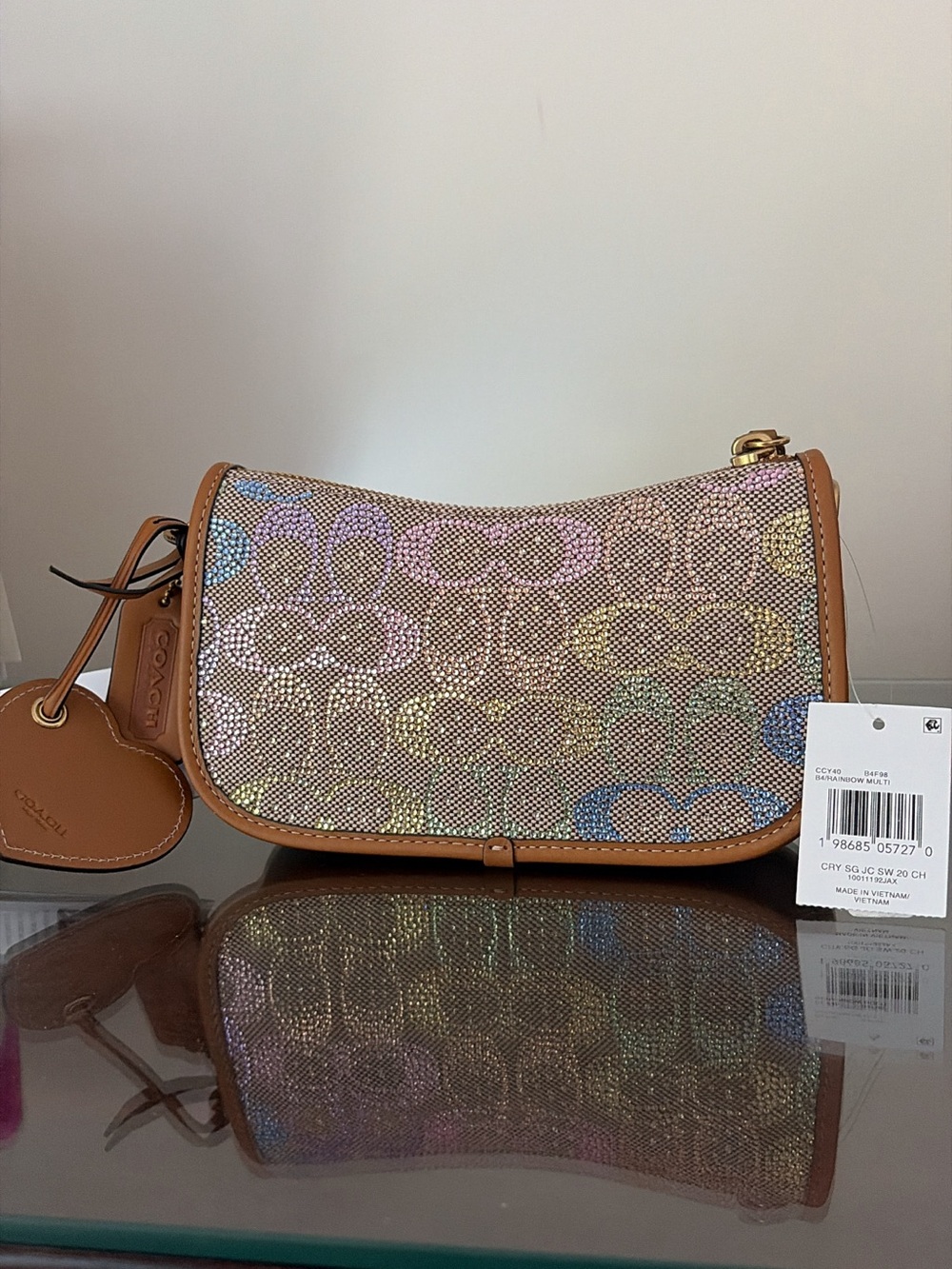 Coach Rainbow Signature Canvas Saddle Bag in Tan with Multicolor Logo
